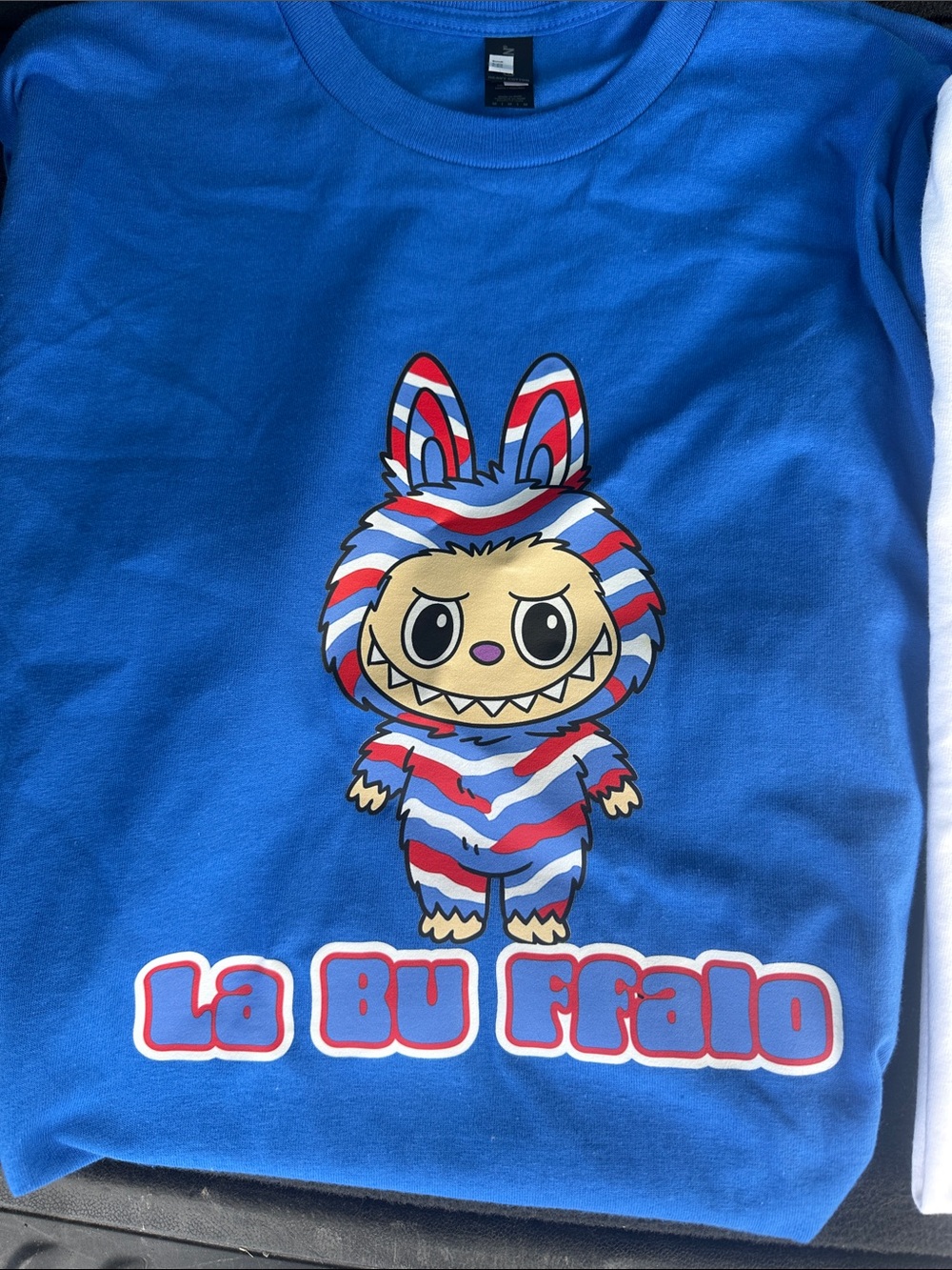 La BU Ffalo Blue Graphic Tee with Red & White Striped Character